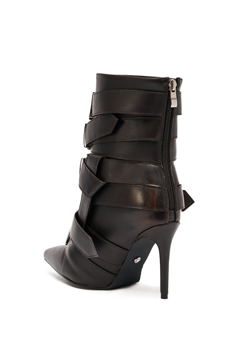 The AZALEA WANG ALCETAS Chocolate Stiletto Bootie features a high heel, pointed toe, dark brown leather, multiple buckle straps, and a visible side zipper. Shown on a white background. 5