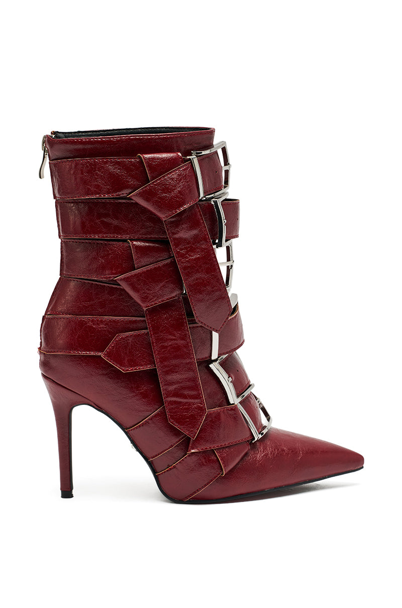 The AZALEA WANG ALCETAS RED STILETTO BOOTIE WITH BUCKLES is crafted in faux leather with multiple wide straps, square silver buckles, a pointed toe, and a back zipper—delivering bold, chic ankle boots. 3