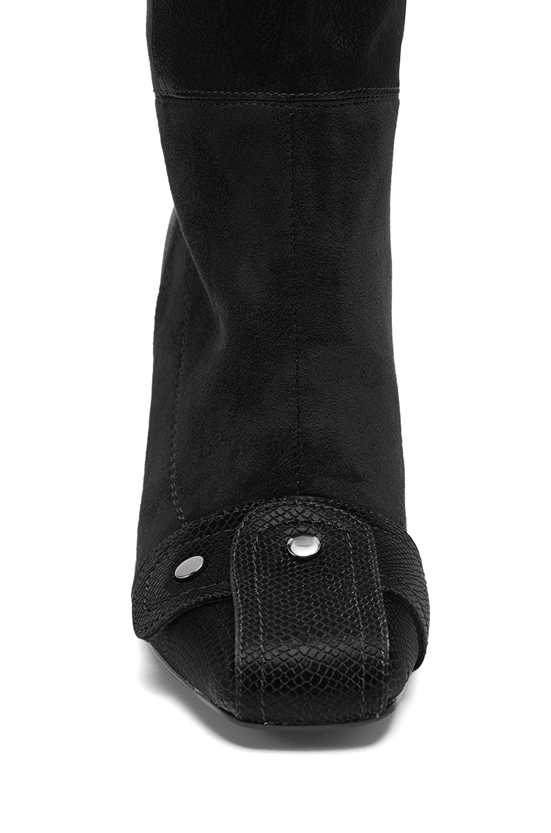 Close-up front view of the AZALEA WANG ALLONAS BLACK KNEE HIGH CHUNKY BOOT in suede, featuring a square toe, textured leather strap, and silver rivet details across the front.
