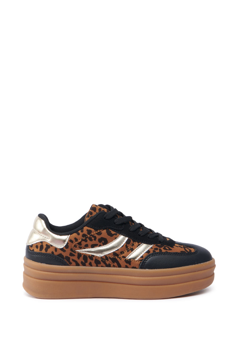 Introducing the AZALEA WANG ALPACA MULTI LEOPARD PLATFORM SNEAKER: This chic sneaker boasts a bold leopard print with metallic leather accents and a chunky gum sole. It comes with black laces and features a sleek, rounded design, made from faux suede to blend fashion with comfort effortlessly. 3