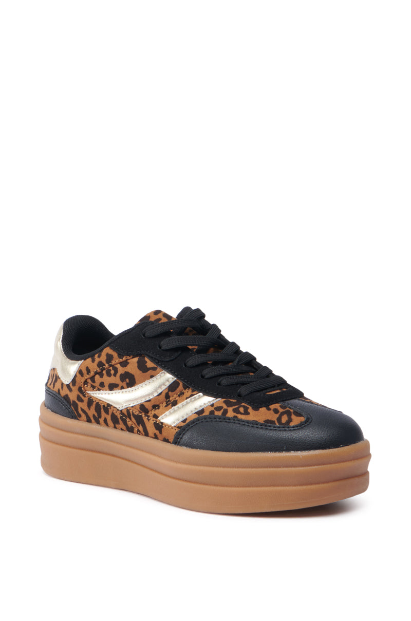 Introducing the AZALEA WANG ALPACA MULTI LEOPARD PLATFORM SNEAKER, a striking shoe that blends stylish design with bold colors. This sneaker is detailed with metallic leather accents and black finishes, featuring sleek white stripes on the sides. It boasts a thick brown sole and black laces for an effortlessly fashionable look. 4