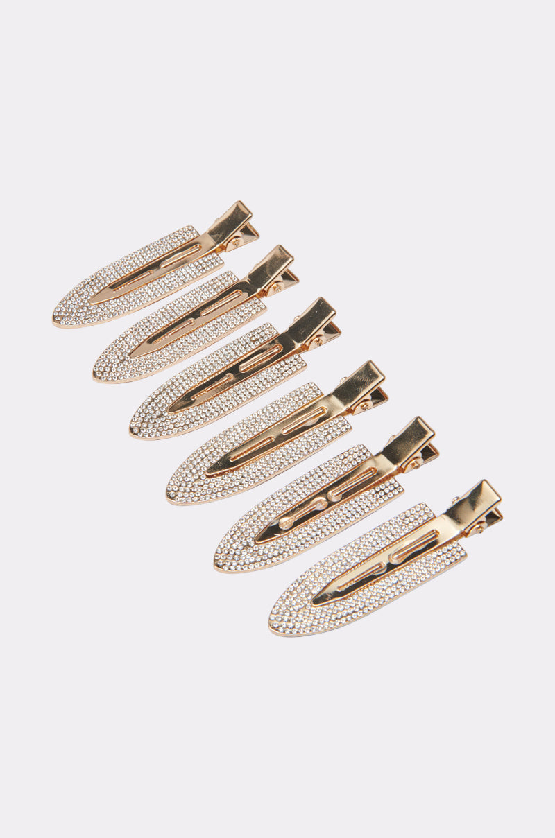 Six TOO PRETTY FOR THIS BLING HAIR CLIPS in gold-tone with clear rhinestones are arranged in two parallel rows on a white background—stylish alligator clips, ideal for adding sparkle to any occasion.
