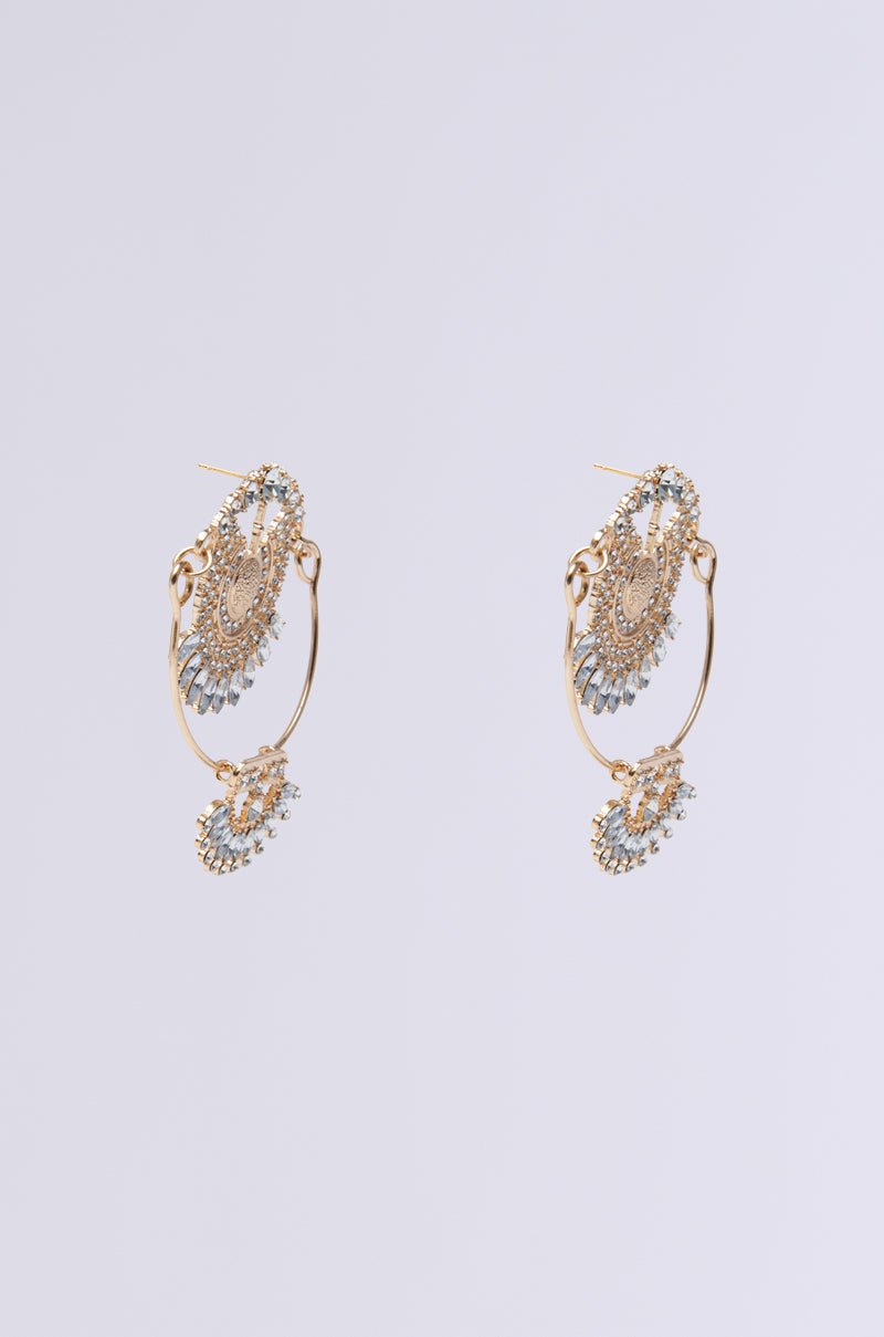 The ART DECO DREAMING EARRING pair features vintage luxury gold hoops with intricate filigree designs and dazzling rhinestone embellishments, set against a plain light gray background.