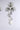 The PRETTY LADY EARRING features a delicate floral sculpture crafted from transparent, wire-like material in a vertical arrangement. The flowers and leaves resemble an elegant metallic bouquet against a light gray background.