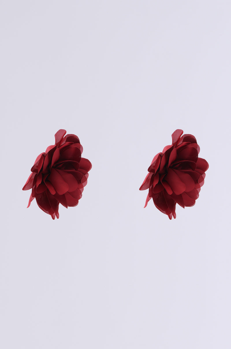 Two deep red FULL BLOOM EARRINGS on a white background. Each earring showcases an oversized flower silhouette with layered petals, creating a symmetrical and striking effect. 4