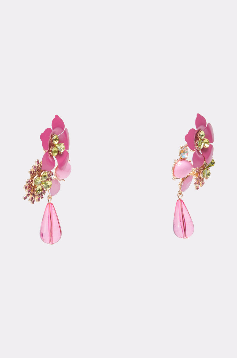 The BLISS EARRING features pink floral designs with gold accents, green gemstone details, and pink teardrop dangles—an eye-catching statement piece showcased on a plain white background. 2