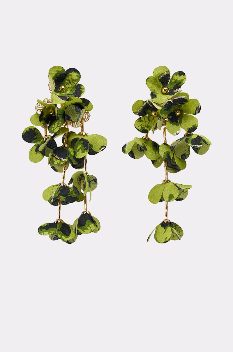 The CATCH ME IF U CAN EARRING features clusters of green and black floral-shaped fabric pieces on gold wires, creating a cascading, leafy look. 2