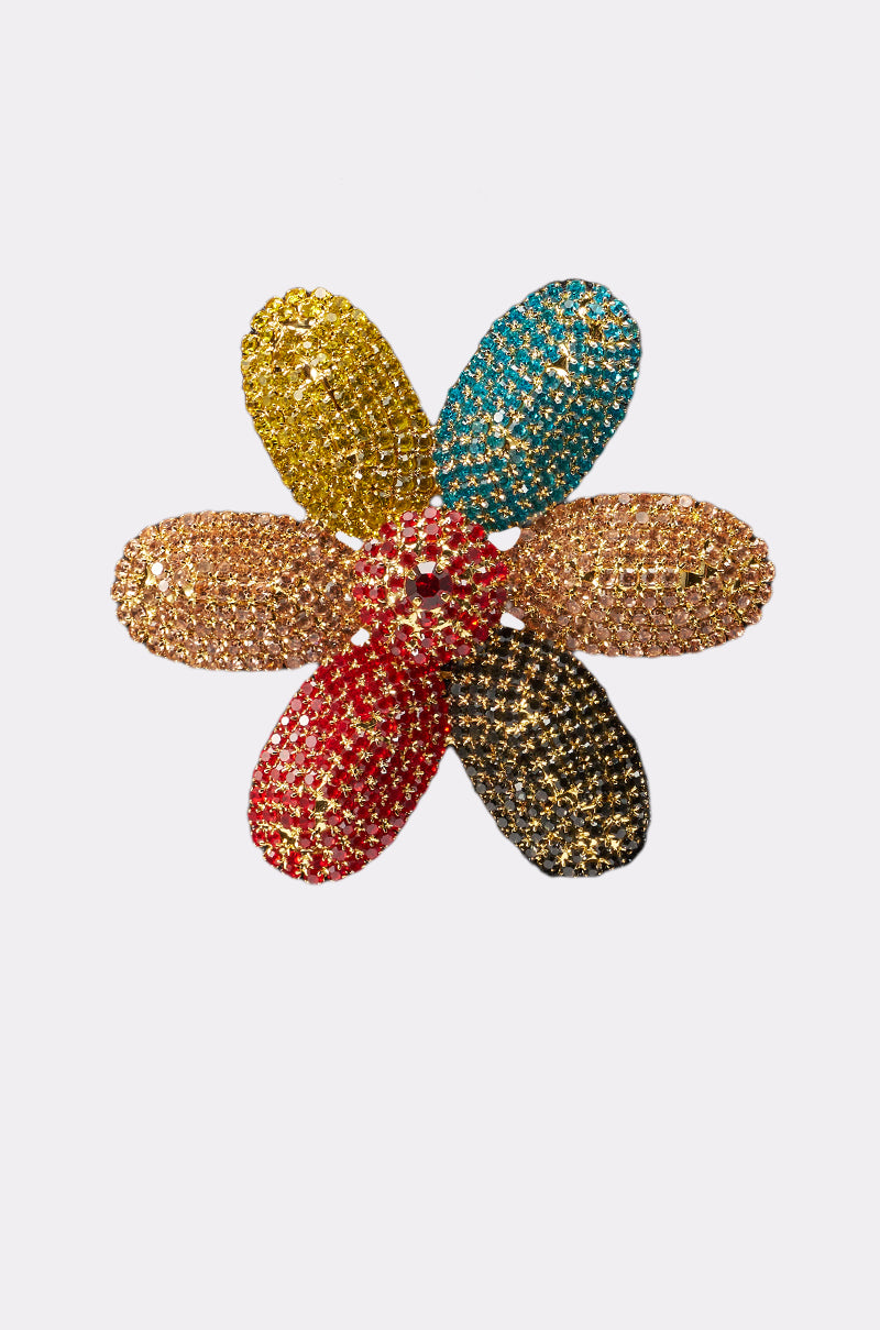 The TAKE ME TO JAPAN EARRING features six flower-shaped petals adorned with sparkling rainbow rhinestones—yellow, blue, pink, gold, orange, and black—capturing vibrant style against a simple white backdrop. 3