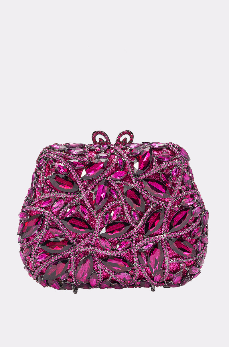 The BLING BLING PURSE is a decorative formal evening bag featuring large, leaf-shaped pink gemstones and intricate sparkling details, displayed on a plain white background.