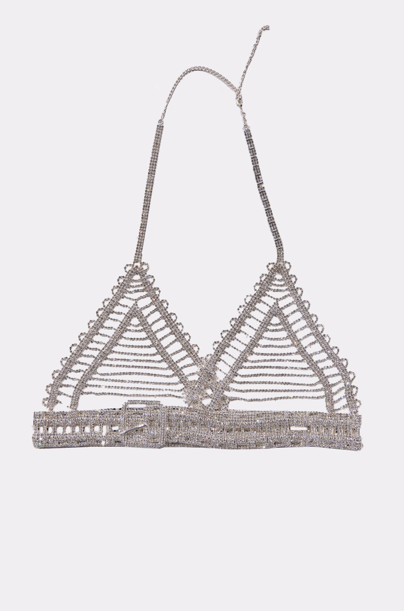 Turn heads at any festival with the WIND IT UP BODY CHAIN—a sparkly silver triangular bralette crafted from thin metallic chains, featuring an intricate geometric design and adjustable straps for statement-worthy jewelry flair.