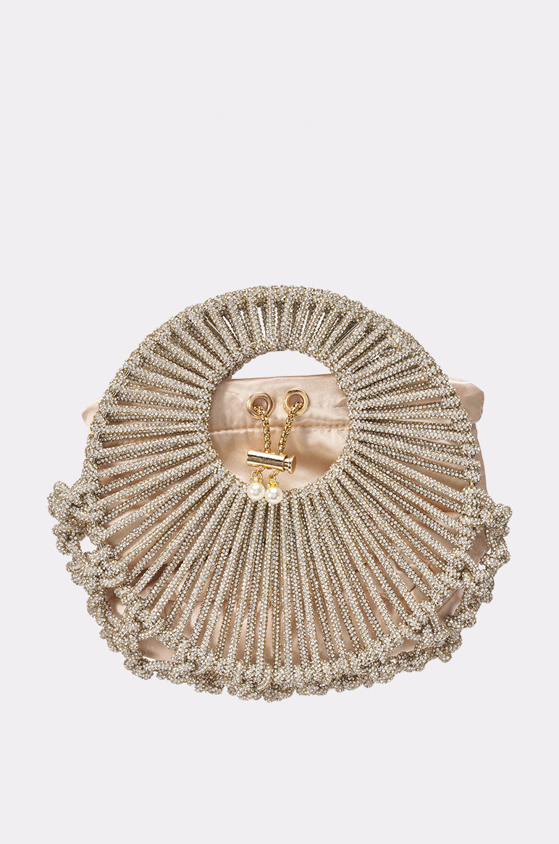 The ELEGANT CLUTCH is a round silver rhinestone bag featuring an open circular handle, detailed beadwork, and a satin pouch inside, all shown against a plain white background.