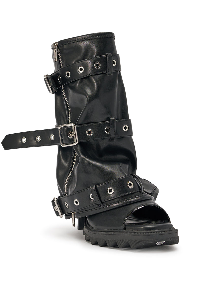The AZALEA WANG AMES BLACK PU HARDWARE EMBELLISHED STILETO BOOTIE is a black faux leather mid-calf bootie featuring hardware embellishments, an edgy design, and a stiletto heel for bold, standout style. 4