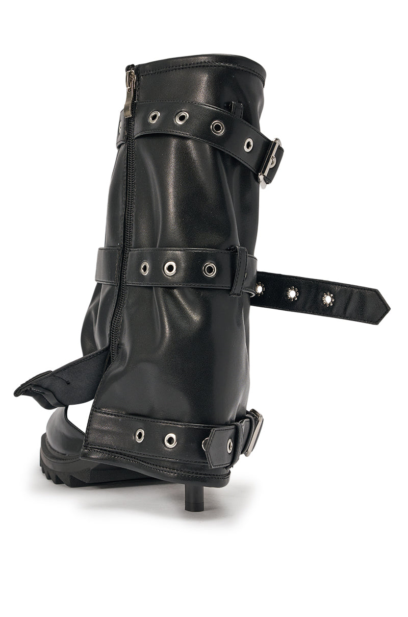 The AZALEA WANG AMES BLACK PU HARDWARE EMBELLISHED STILETTO BOOTIE features silver eyelets, multiple buckled straps, a side zipper, a slim stiletto heel, and partially undone top and side straps for an edgy look. 5