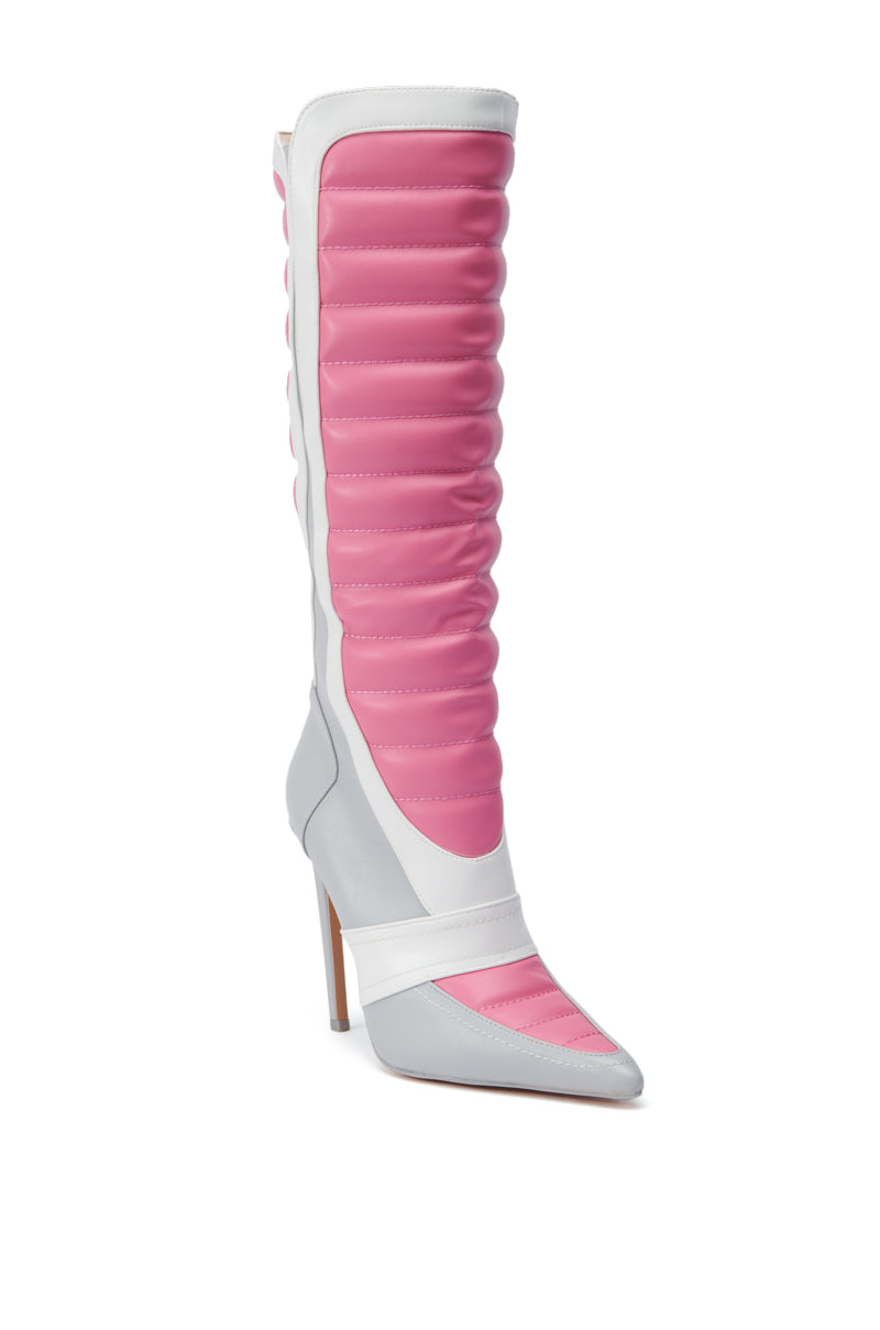 Discover the bold, contemporary style of our AZALEA WANG AMORETTA PINK COLOR BLOCK STILETTO BOOT. These fashionable knee-high boots showcase quilted pink and smooth white panels made from high-quality faux leather. Featuring a pointed toe and a sleek stiletto heel, they seamlessly combine cutting-edge design with audacious elegance.