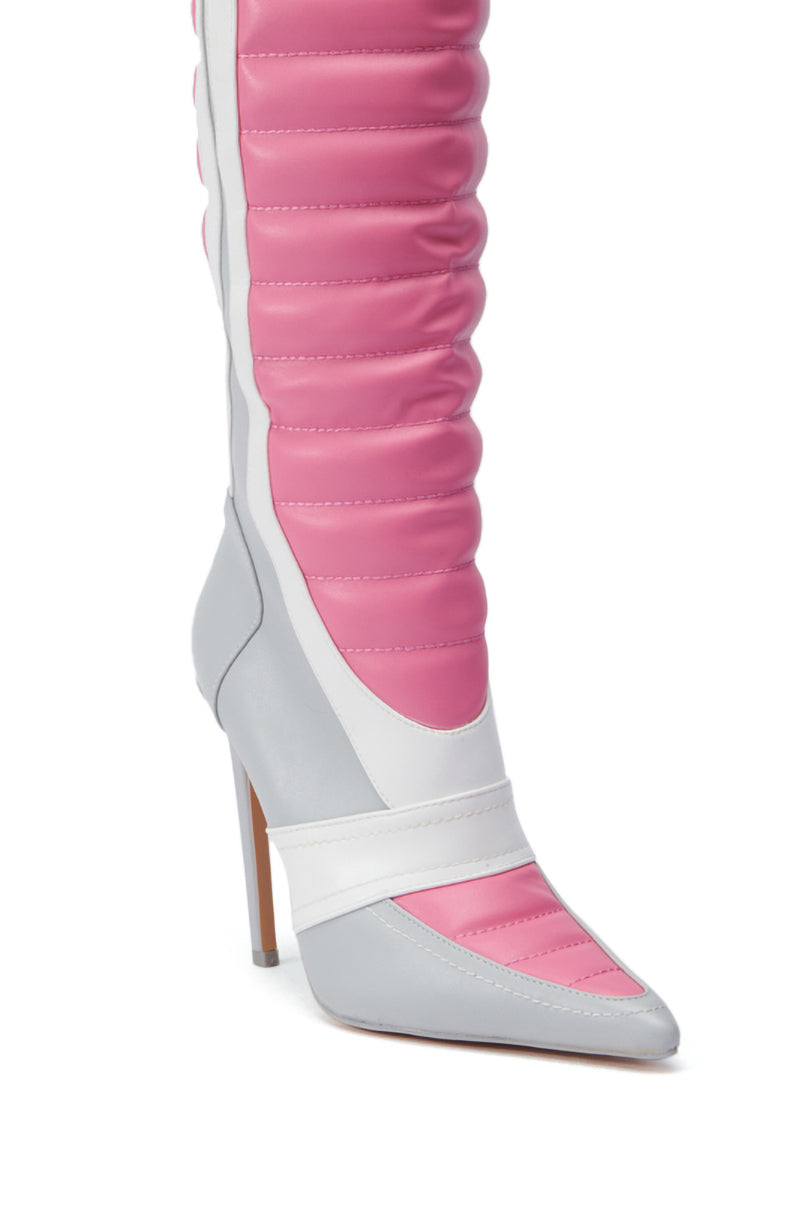 The AZALEA WANG AMORETTA PINK COLOR BLOCK STILETTO BOOT features a chic mid-calf design with pink quilted material, white accents, and light grey details. Its pointed toe and sleek style provide a modern, fashionable look.
