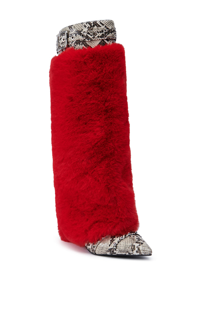 Presenting the AZALEA WANG AMOURA RED FUR AND SNAKE BOOT: a knee-high stiletto boot that combines a vibrant red fur exterior with striking faux snakeskin detailing on the pointed toe and top strap. Finished with a metal buckle, this design merges bold textures for an unforgettable fashion statement.
