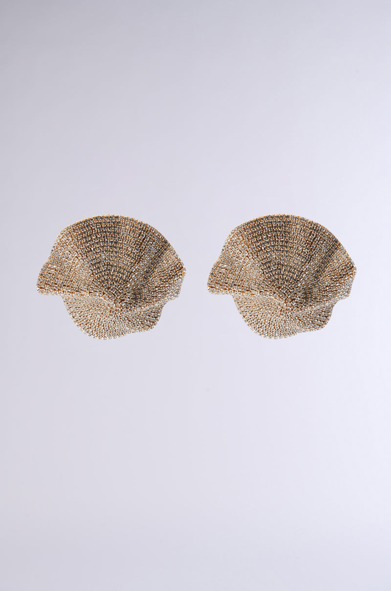 Two DONT BE BASIC EARRING sets, elegantly showcasing the AKIRA Label, are displayed side by side against a plain gray background. The earrings boast a textured, chic design that exudes understated elegance.