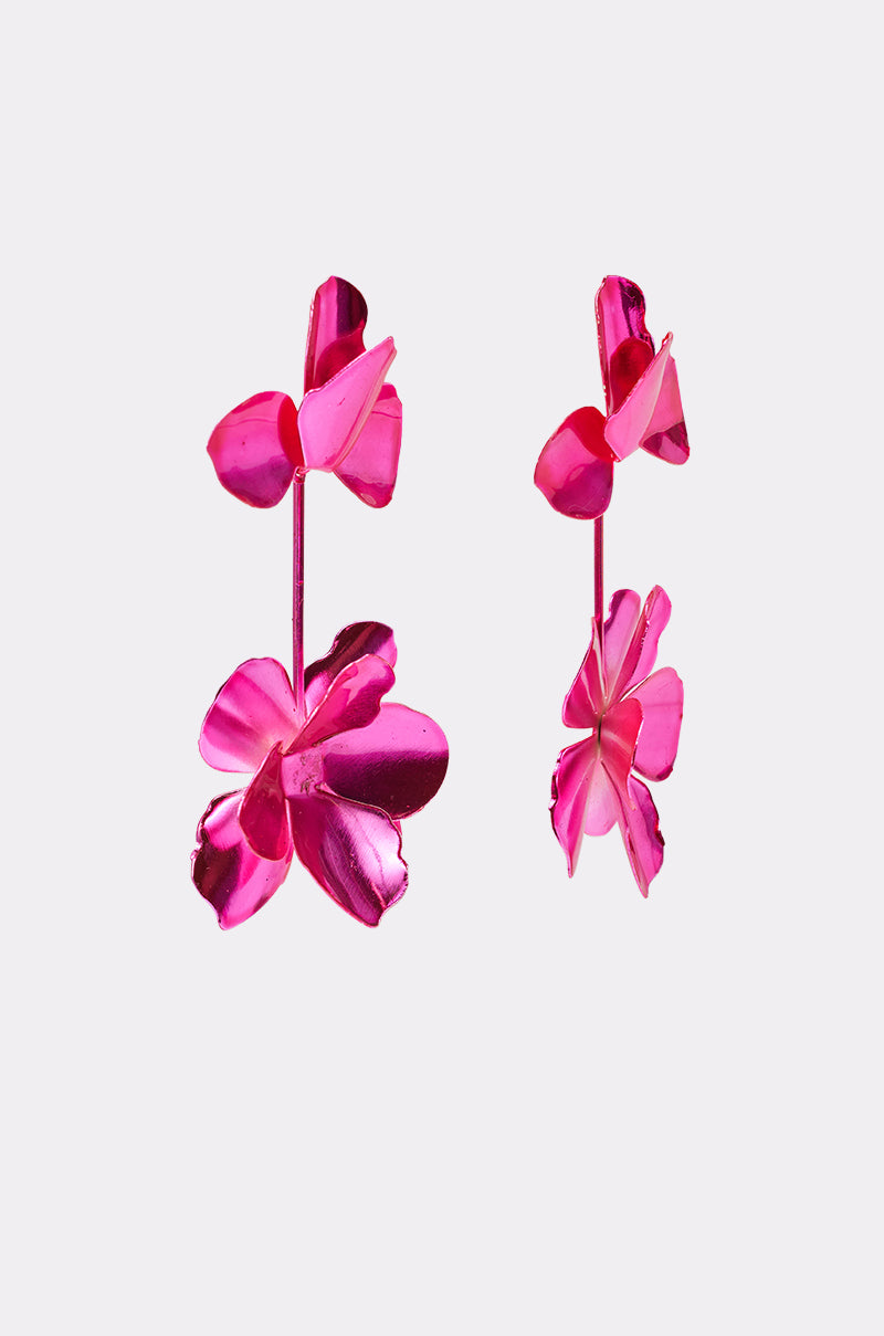 A pair of shiny, hot pink ASH FLOWER EARRING with a double-flower design and layered petals, displayed on a plain light background. 3