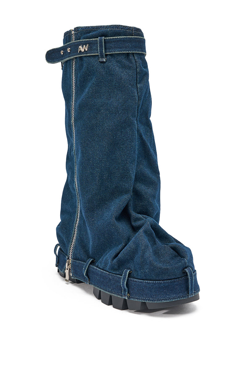 The AKIRA GOLD ANGELA FOLD OVER PLATFORM BOOT IN DARK DENIM features an oversized slouch design, front zipper, adjustable top strap, and chunky lug sole for bold style. 5