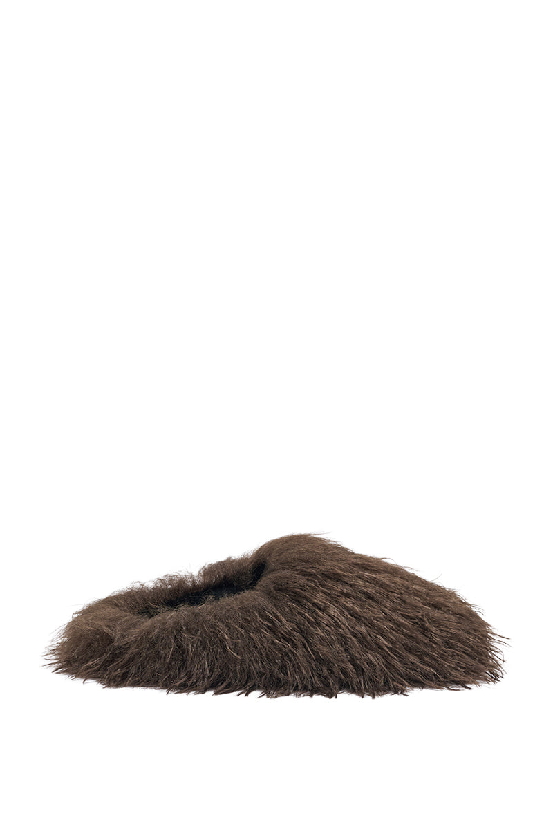 The AKIRA ANGOL CHOCOLATE SHAGGY FLAT SLIPPER, featuring fluffy faux fur and a cozy slide-on design, is displayed on a plain white background. 3