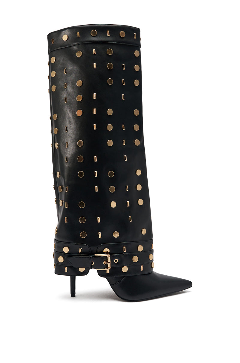 The AZALEA WANG ANISSA BLACK MULTI GOLD HARDWARE STILETTO BOOT is a knee-high faux leather boot with gold circular studs, pointed toe, low heel, and a gold buckle strap at the ankle.
