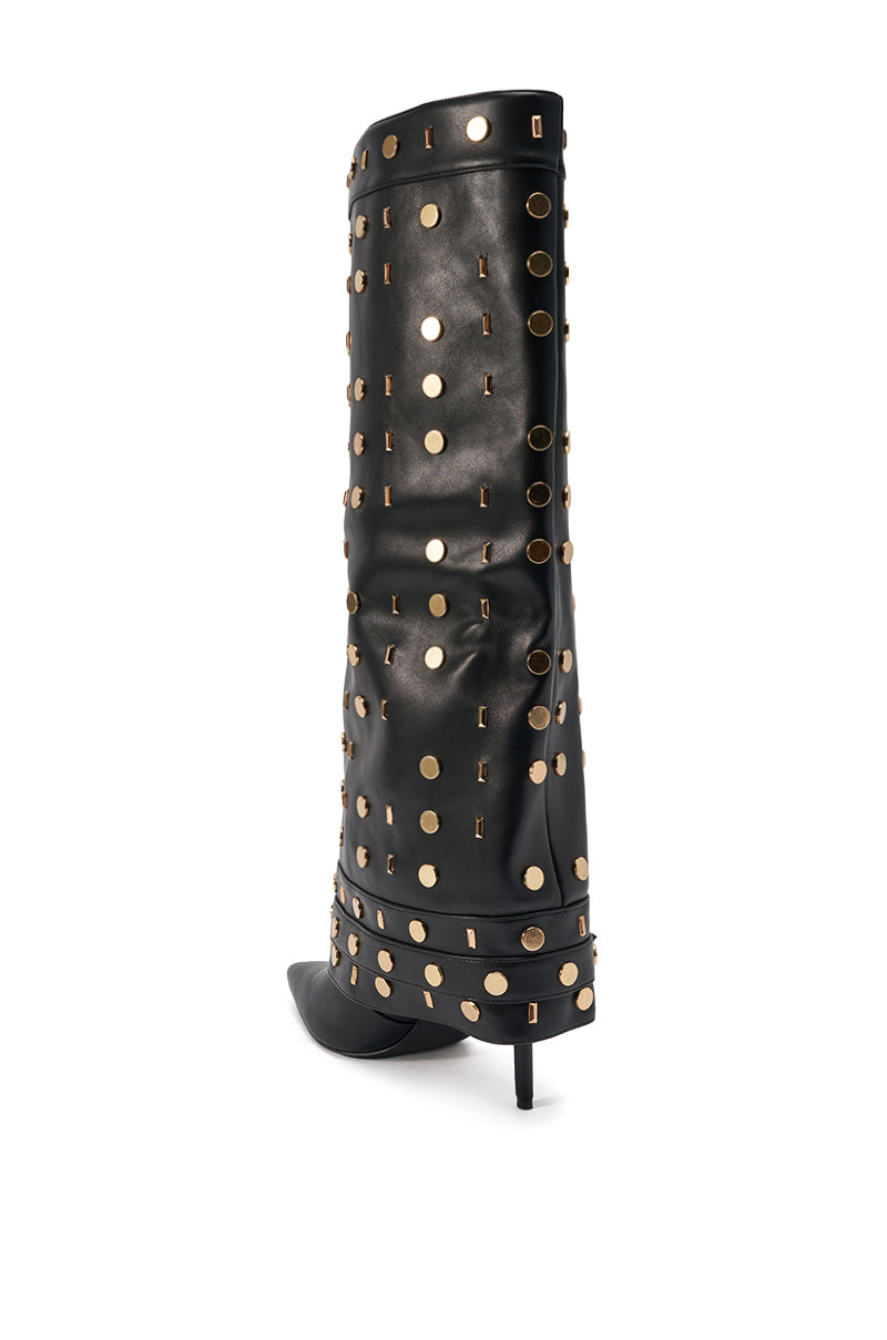 The AZALEA WANG ANISSA BLACK MULTI GOLD HARDWARE STILETTO BOOT features black faux leather, a knee-high pointed toe design, thin heel, and bold gold studs arranged in rows for an eye-catching look.