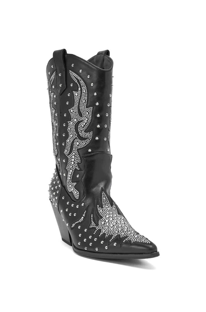 The AZALEA WANG ANKUS BLACK WESTERN RHINESTONE BOOT is crafted from faux leather, featuring a pointed toe, medium heel, and is adorned with silver studs and sparkling rhinestones in intricate patterns.