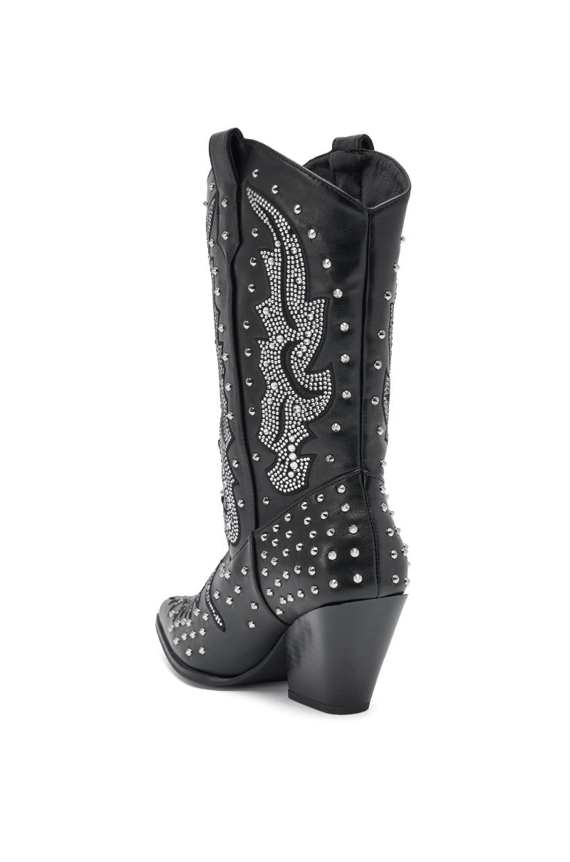 The AZALEA WANG ANKUS BLACK WESTERN RHINESTONE BOOT features a black cowboy-style design with a pointed toe, silver studs, and ornate rhinestone patterns, displayed angled on a white background.