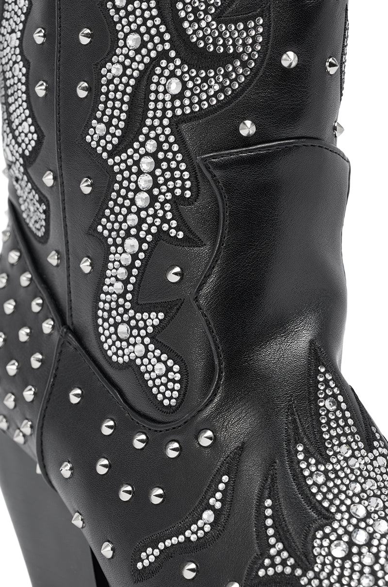 Close-up of the AZALEA WANG ANKUS BLACK WESTERN RHINESTONE BOOT, featuring silver studs and intricate swirling patterns for bold cowboy style paired with detailed craftsmanship.