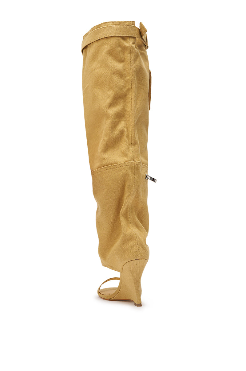 The AZALEA WANG ANOUK KHAKI SPORT WEDGE BOOT features a sturdy tan gaiter with visible seams and a top buckle, perfect for adding street style edge to your look when paired with an open-toe wedge boot. 9