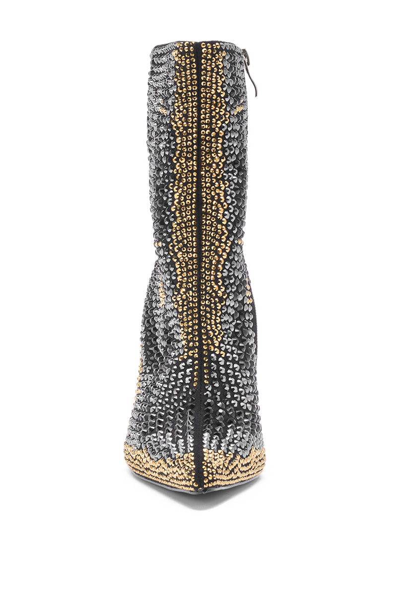 The AZALEA WANG ANSLEY Black Multi Rhinestone Cocktail Bootie is a single black stiletto boot, front view, with a pointed toe, center seam, and covered in gold and silver sequins.
