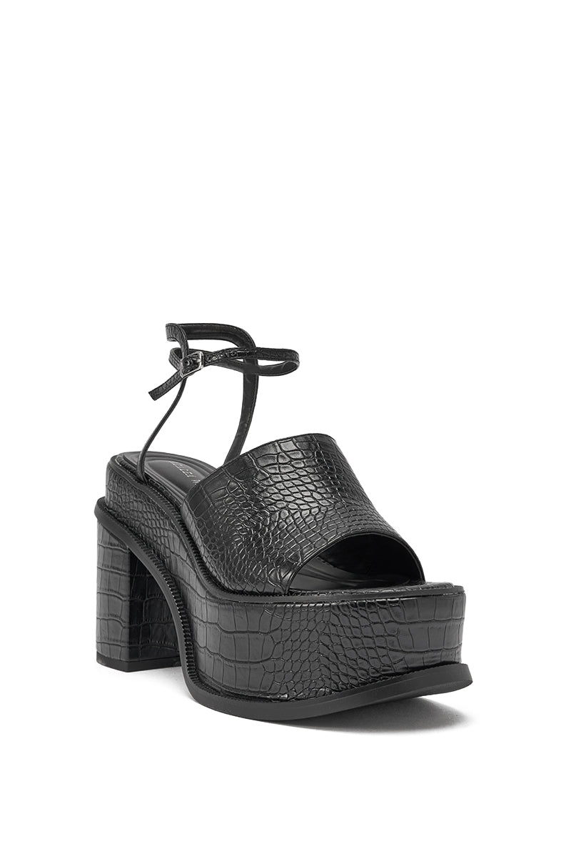 The AZALEA WANG ANTHELMINE BLACK CROC PLATFORM SANDAL features a black, crocodile-embossed faux leather design with an open toe, block heel, and ankle strap with buckle. 4