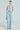 I DONT CHASE I ATTRACT DISTRESSED LIGHT BLUE DENIM JUMPSUIT