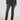 A person wearing STACKS ON STACKS high-rise skinny leg denim pants in gray and a black cropped leather jacket stands against a plain background, their feet clad in black high-heeled boots.