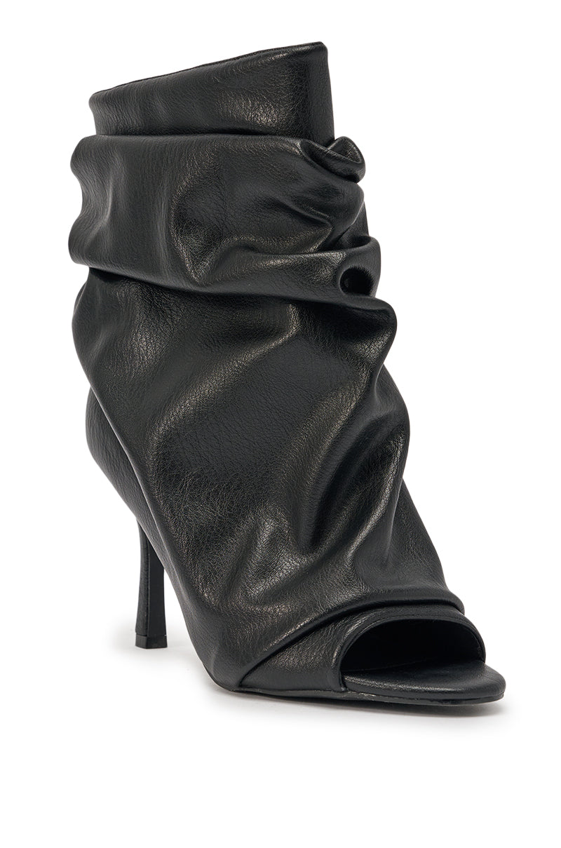 The AZALEA WANG APEX BLACK SLOUCHY OPEN TOE BOOTIE features a stiletto heel and soft, gathered leather with a slouchy, ruched design for a chic, modern look. 4