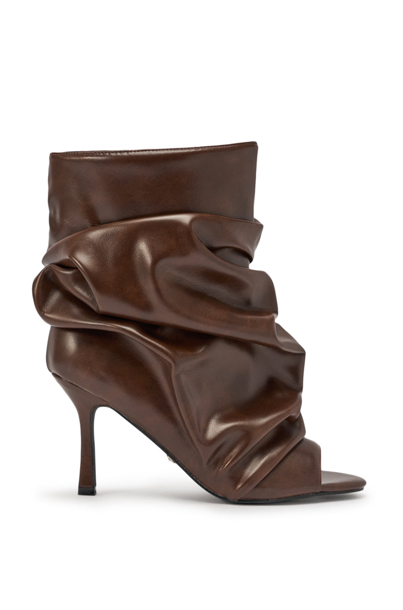 The AZALEA WANG APEX BROWN SLOUCHY OPEN TOE BOOTIE features chocolate faux leather, a pointed heel, open toe, and a ruched, slouchy design around the ankle and upper foot. 4