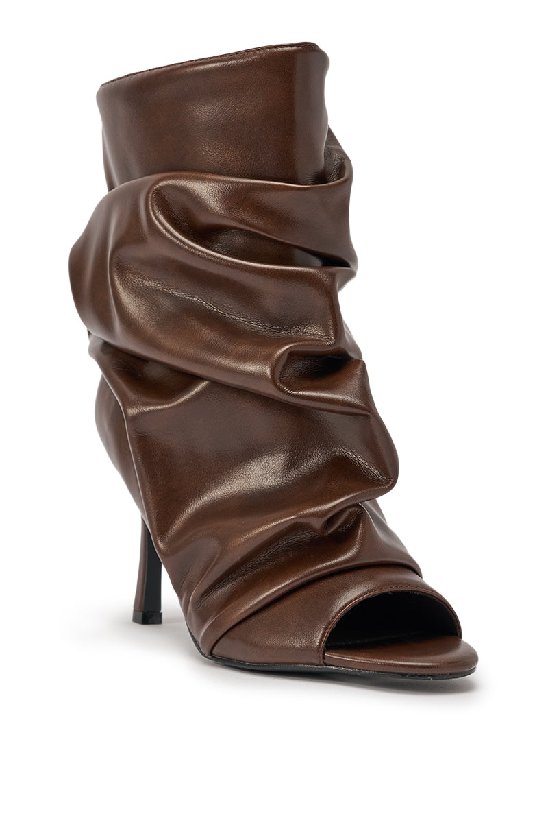 The AZALEA WANG APEX BROWN SLOUCHY OPEN TOE BOOTIE features dark chocolate faux leather, a ruched design, and an open toe, shown against a white background. 5