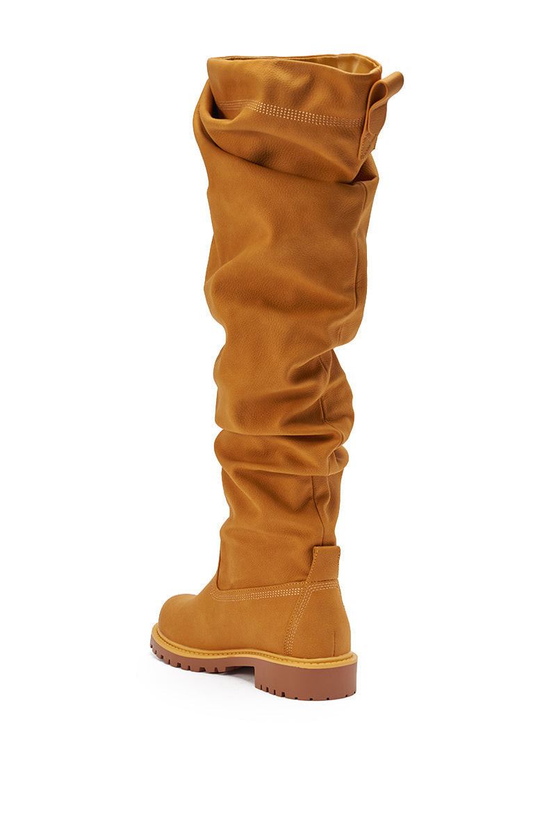 The AZALEA WANG ARDIS Tan Ruched Flat Boot combines slouchy style with a chunky sole and low block heel, beautifully captured in a photo on a white background. 5