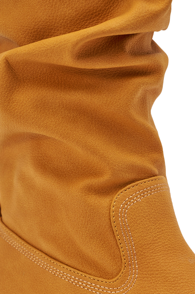 Close-up of the AZALEA WANG ARDIS Tan Ruched Flat Boot, featuring visible stitching and a slouchy, textured knee-high shaft. 6
