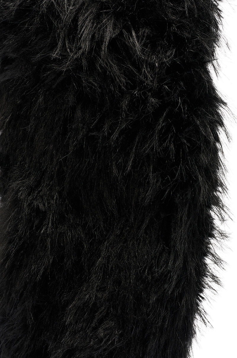 Close-up of the AZALEA WANG ARETE BLACK FUR STILETTO BOOT, showing its dense, fluffy black faux fur and rich, textured finish.