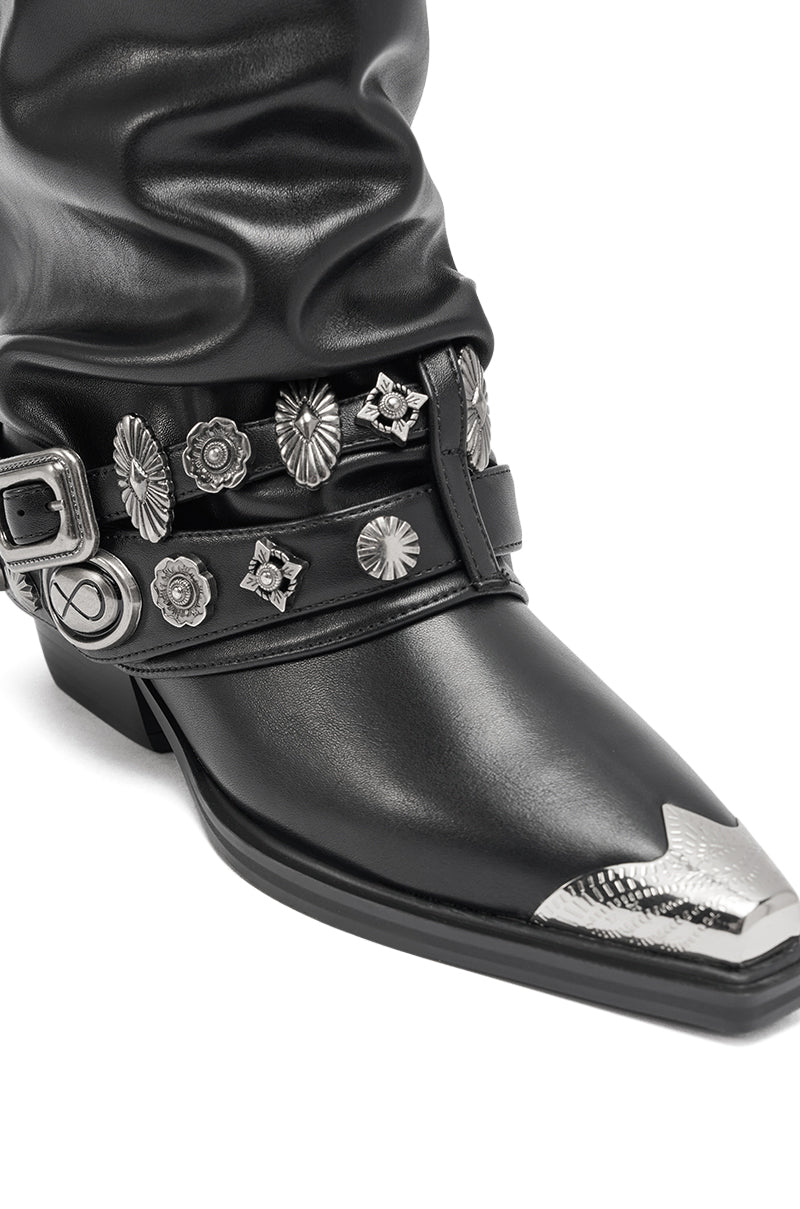 Close-up of the AZALEA WANG ASHRAF Black PU Western Bootie, featuring silver hardware, a side buckle strap, decorative conchos, chunky heel, and pointed toe with detailed metal tip.