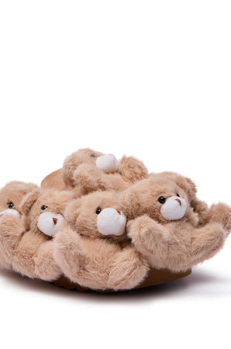 The AZALEA WANG AURORA BEIGE TEDDY BEAR CLOG features fuzzy clog slippers adorned with multiple plush light brown teddy bears, each with white snouts and playful 3D bear details, set against a plain white background.