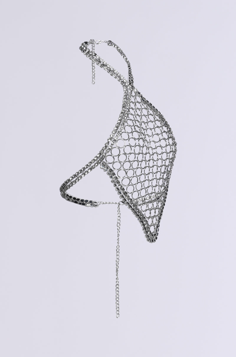 The IYKYK LUXE BODY CHAIN is a wireframe metallic handbag that boasts a stunning geometric design with a triangular shape and linked circles, radiating bling. It features a chic chain strap and is adorned with a gemstone chain link tassel hanging from the bottom, all set against a simple white background.