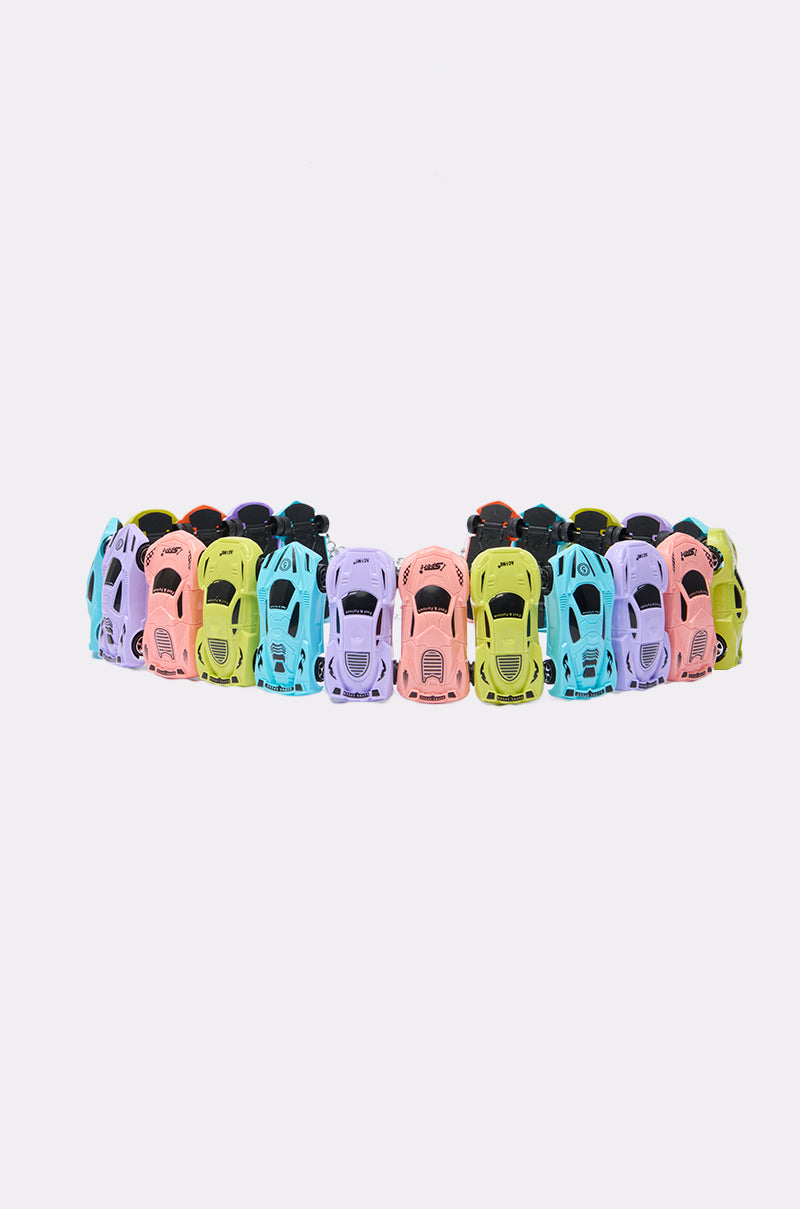 A row of colorful toy race cars in pink, blue, yellow, green, and purple sits side by side on a white background—each one resembles the playful charms featured on the VROOM CAR BELT, a novelty kids’ accessory.