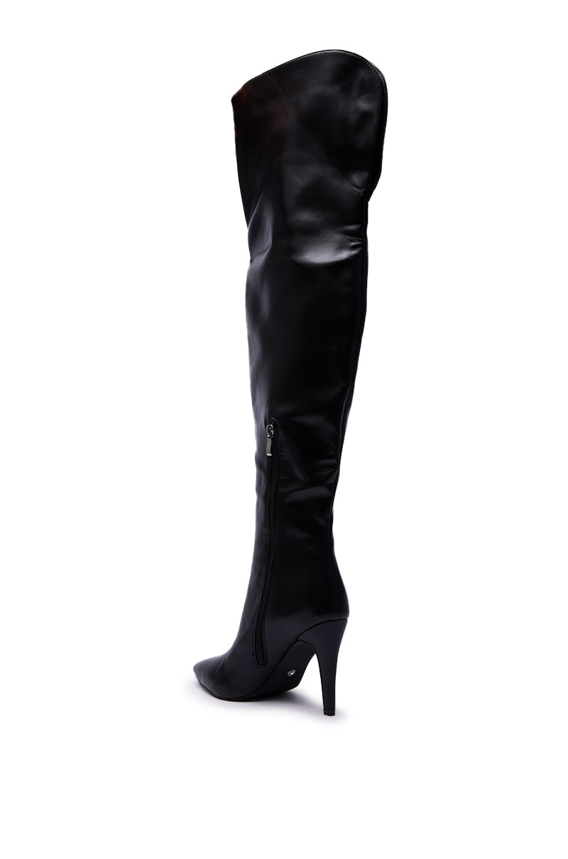 The AZALEA WANG BEAUCOUP BLACK OVER THE KNEE BOOT, a single black thigh-high stiletto with a pointed toe and side zipper in sleek faux leather, is shown on a white background.
