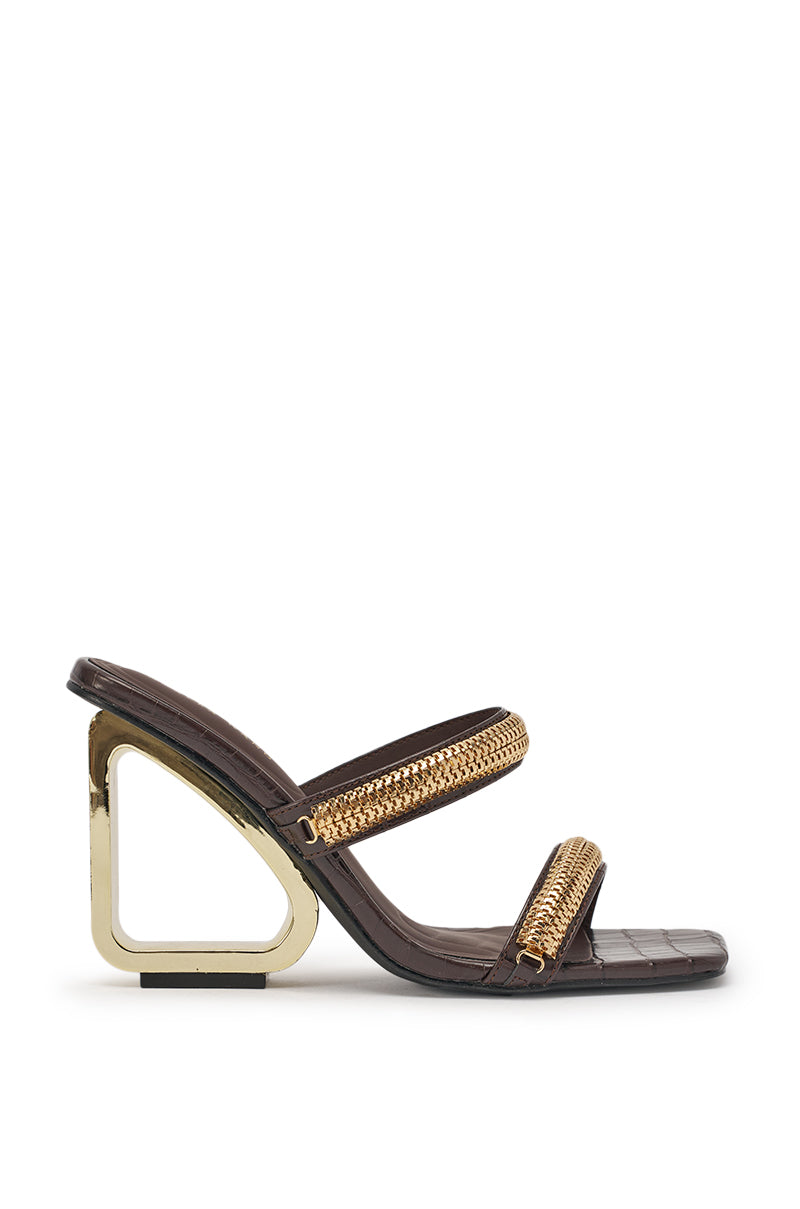 The AZALEA WANG BESSIE CHOCOLATE CROC GOLD EMBELLISHED WEDGE SANDAL features a stylish metallic wedge, geometric gold heel, croc-embossed faux leather sole, and two gold chain straps across the foot. 4