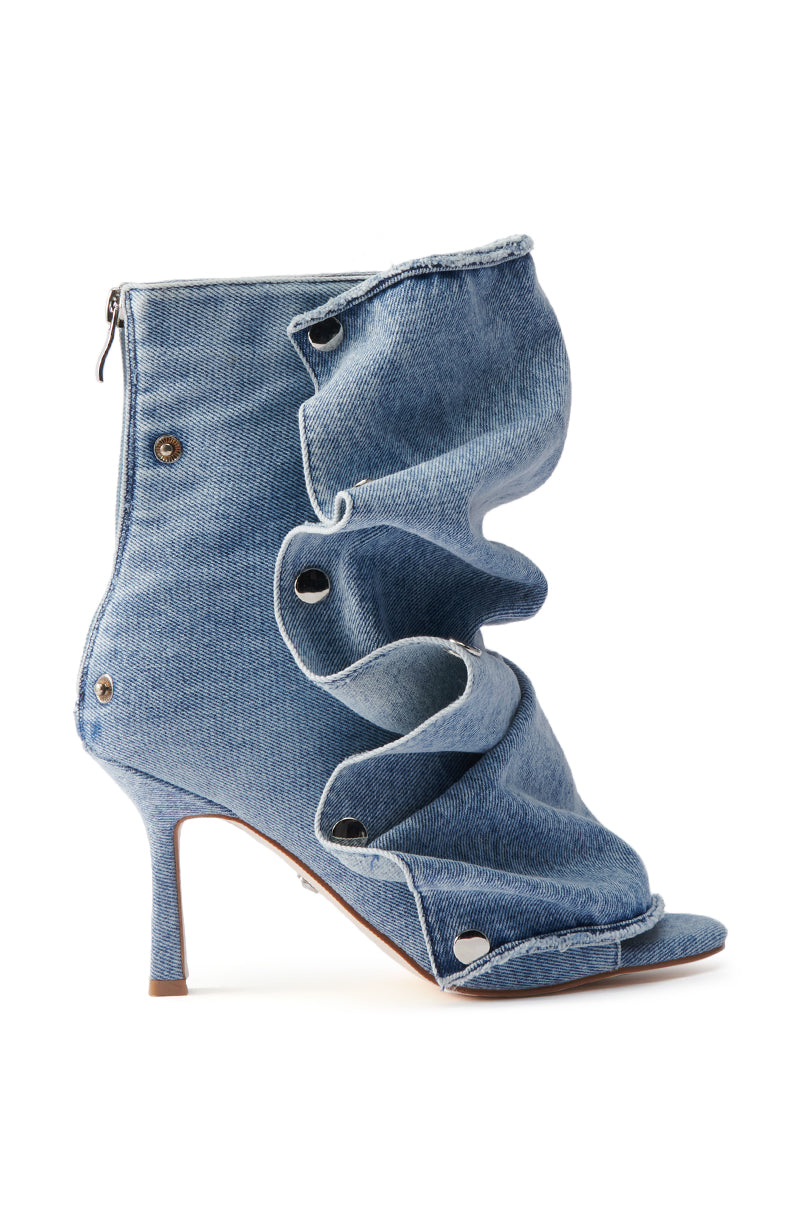 The AZALEA WANG BIRD SONG DENIM OPEN TOE SNAP BOOTIE is a blue denim stiletto bootie with ruffled layers, silver snap buttons, an open almond toe, and a back zipper for easy wear.