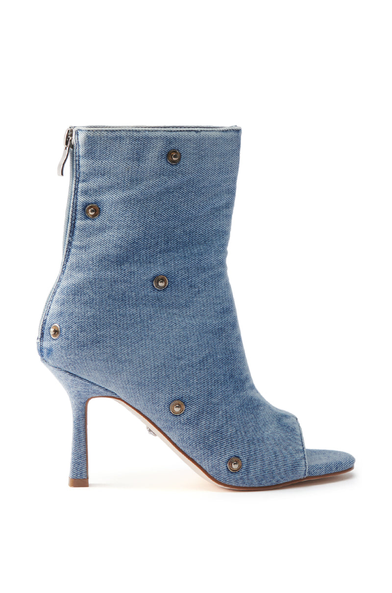The AZALEA WANG BIRD SONG DENIM OPEN TOE SNAP BOOTIE features a mid-height stiletto heel, back zipper, and side metal grommet details, shown against a white background.