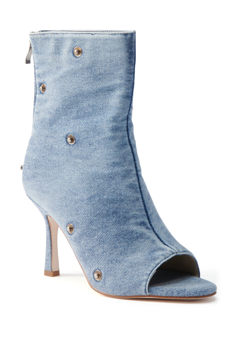 The AZALEA WANG BIRD SONG DENIM OPEN TOE SNAP BOOTIE features a denim texture, open toe, mid-height stiletto heel, and metallic button accents for stylish flair with snap bootie details.