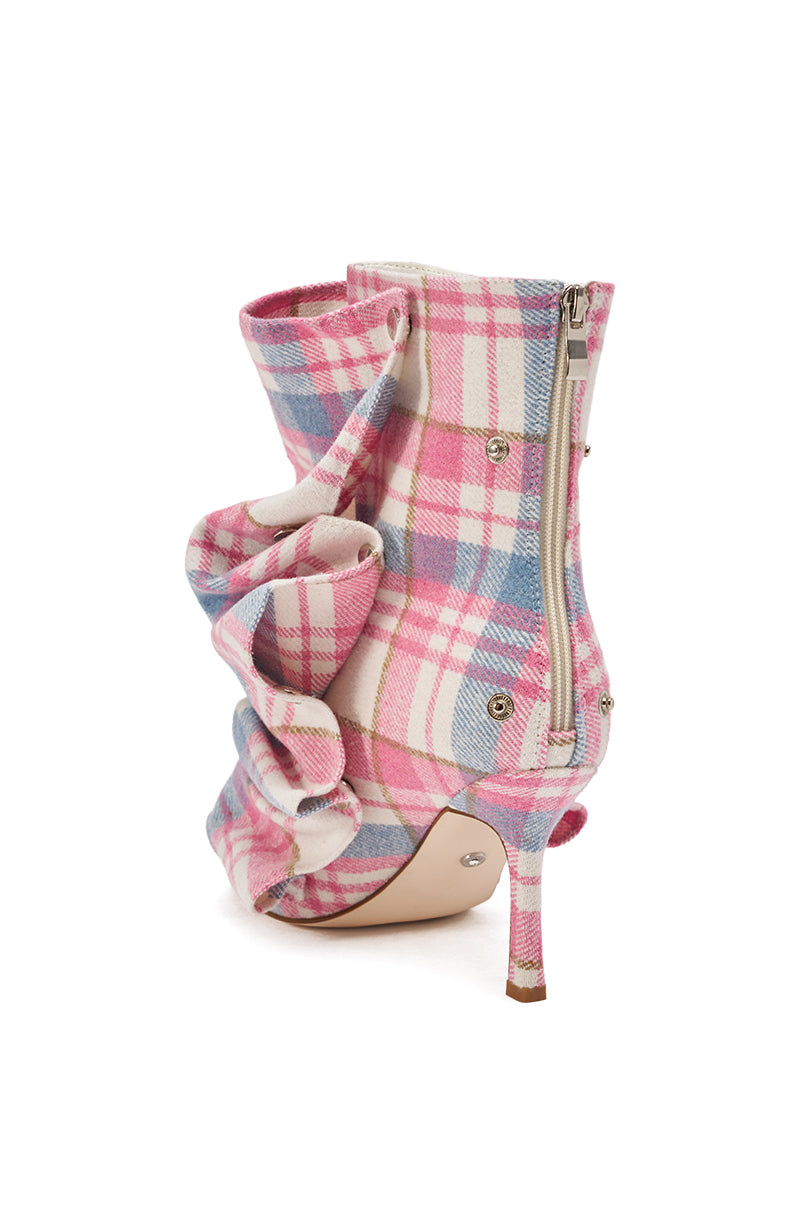 The AZALEA WANG BIRD SONG PINK PLAID MULTI OPEN TOE SNAP BOOTIE features a high heel, blue and white plaid pattern, dramatic ruffled fabric details, and a back zipper, shown against a white background.